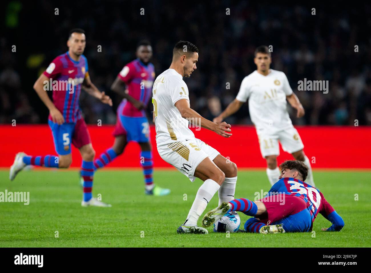 SYDNEY, AUSTRALIA - MAY 25: Gavi of Barcelona takes off his training jersey  to give to the crowd during the International football match between FC  Barcelona and A-Leagues All Stars on May