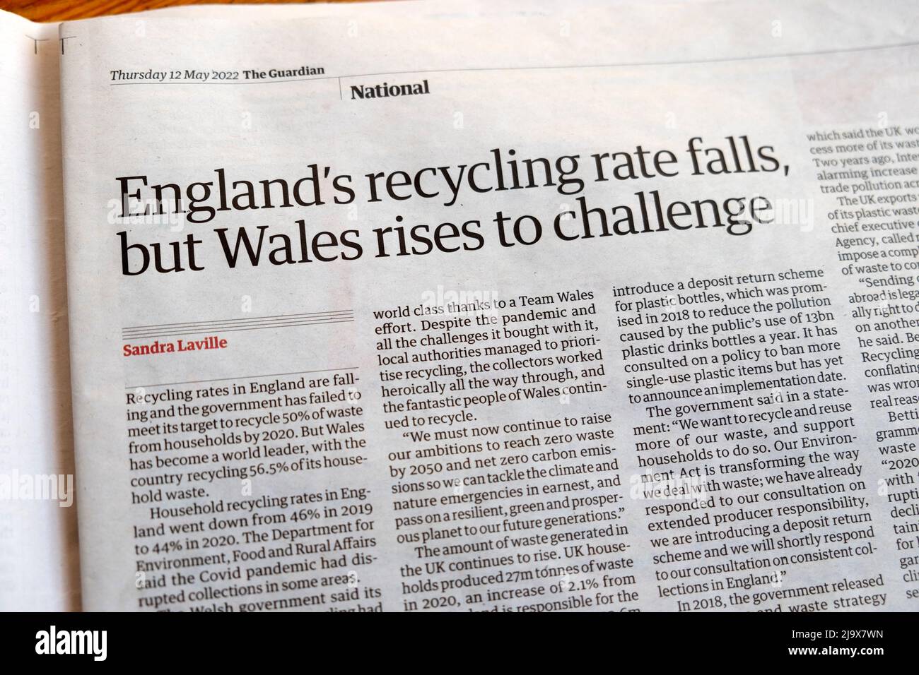 'England's recycling rate falls but Wales rises to challenge' Guardian newspaper headline recycling article clipping 12 May 2022 London England UK Stock Photo