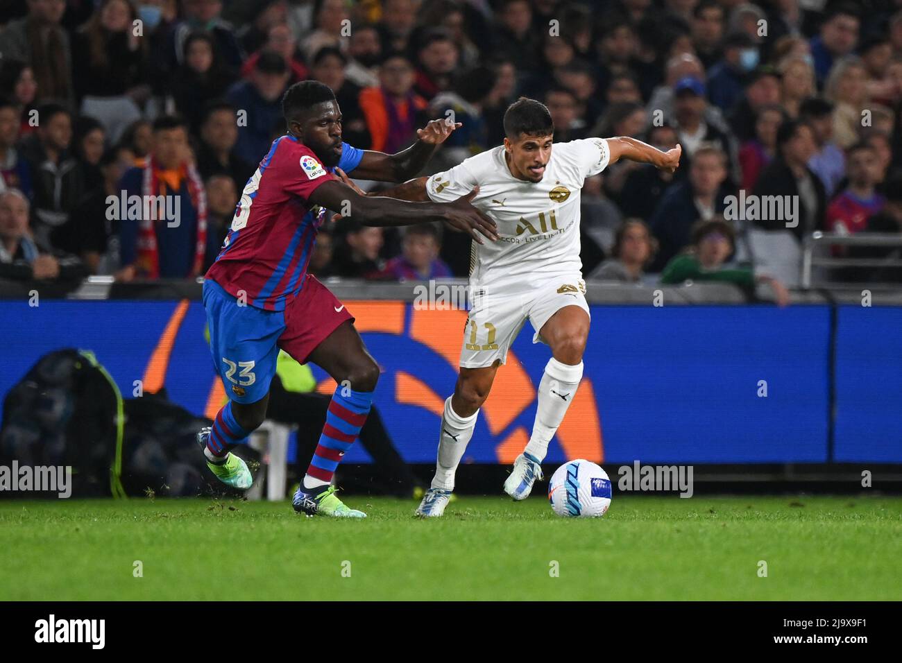 Sydney Olympic Park, Australia. 25th May, 2022. Samuel Yves Umtiti (L) of FC Barcelona team and Daniel dos Santos Penha (R) of A-Leagues All Stars team in action during the match between FC Barcelona and the A-League All Stars at Accor Stadium. (Final score; FC Barcelona 3:2 A-Leagues All Stars). (Photo by Luis Veniegra/SOPA Images/Sipa USA) Credit: Sipa USA/Alamy Live News Stock Photo