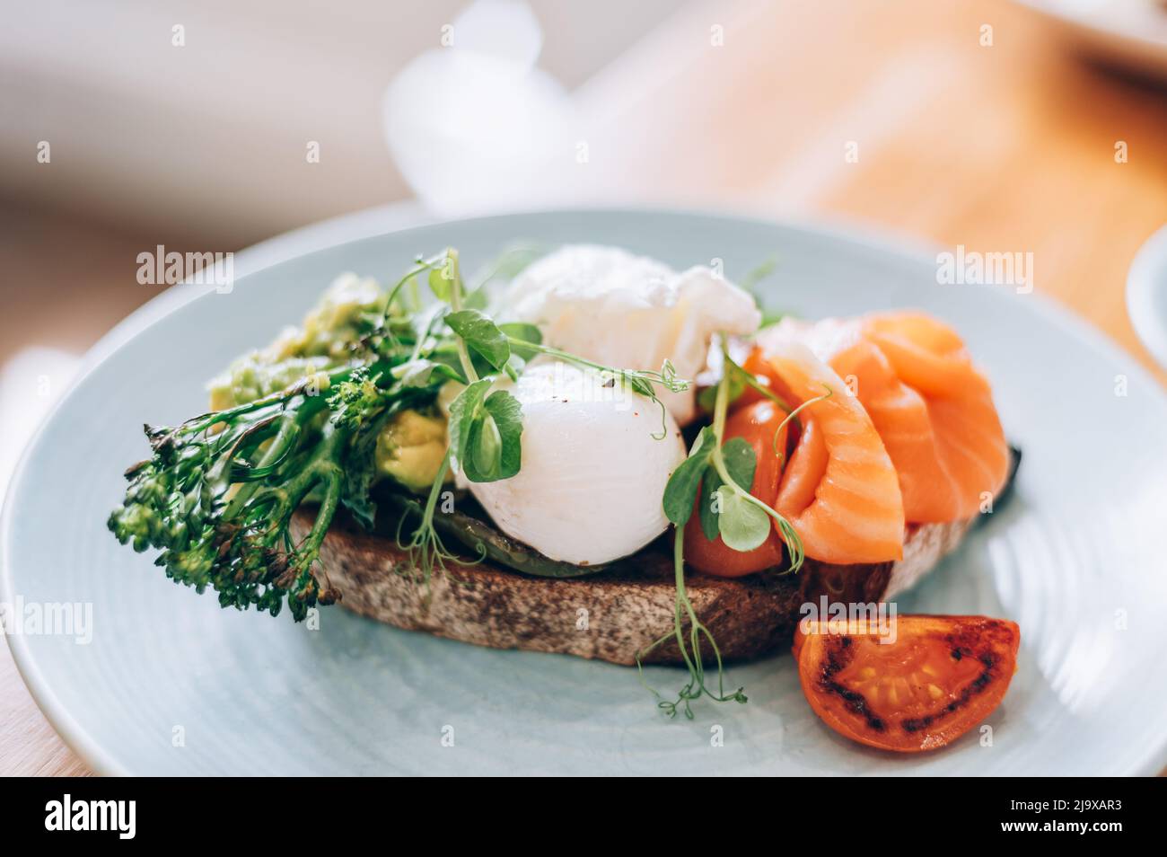 Healthy breakfast from poached eggs and veggies Stock Photo