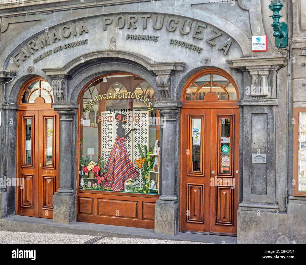 The distinctive shop front of Farmacia Portugueza in Funchal, Madeira. The business does back to 1917 and the shop front to 1924. Stock Photo