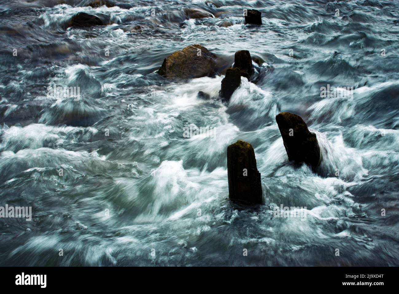 Wiled Rivers Old abstract background old beams in the wild river Stock Photo - Alamy