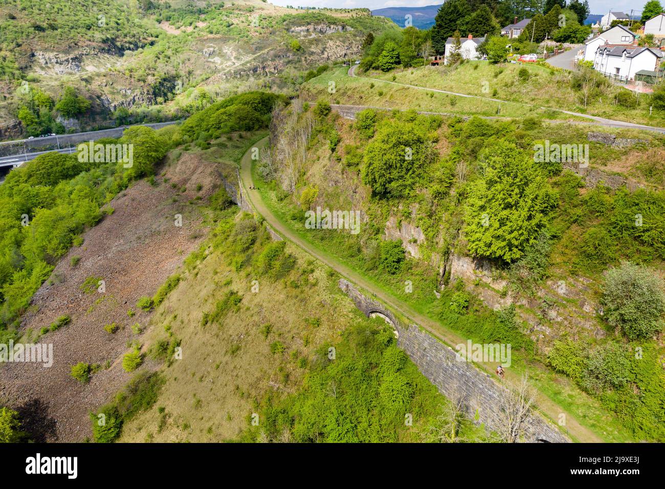 Aerial view of an old tram road converted to a cycle route near the village of Clydach in South Wales, UK Stock Photo