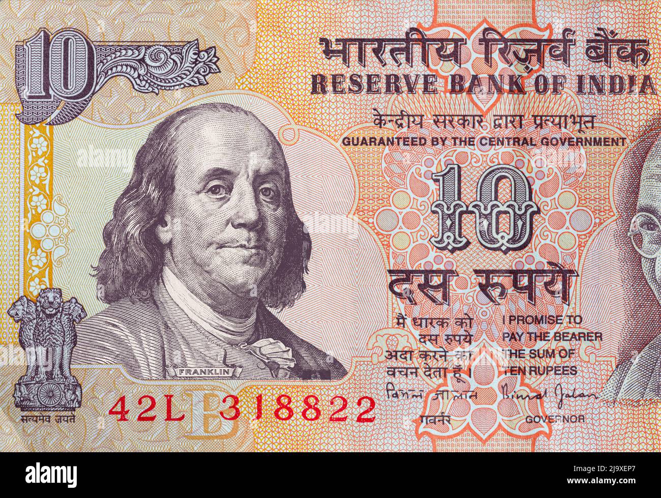 old 10 Indian rupee obverse with superimposed Benjamin Franklin from 100 dollar banknote for design purpose Stock Photo