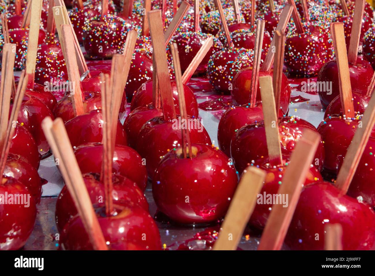 Toffee apples or candy apples, also known as 'maçãs do amor' in Brazil, treat traditionally served during the festivities of Círio de Nazaré in Belém Stock Photo