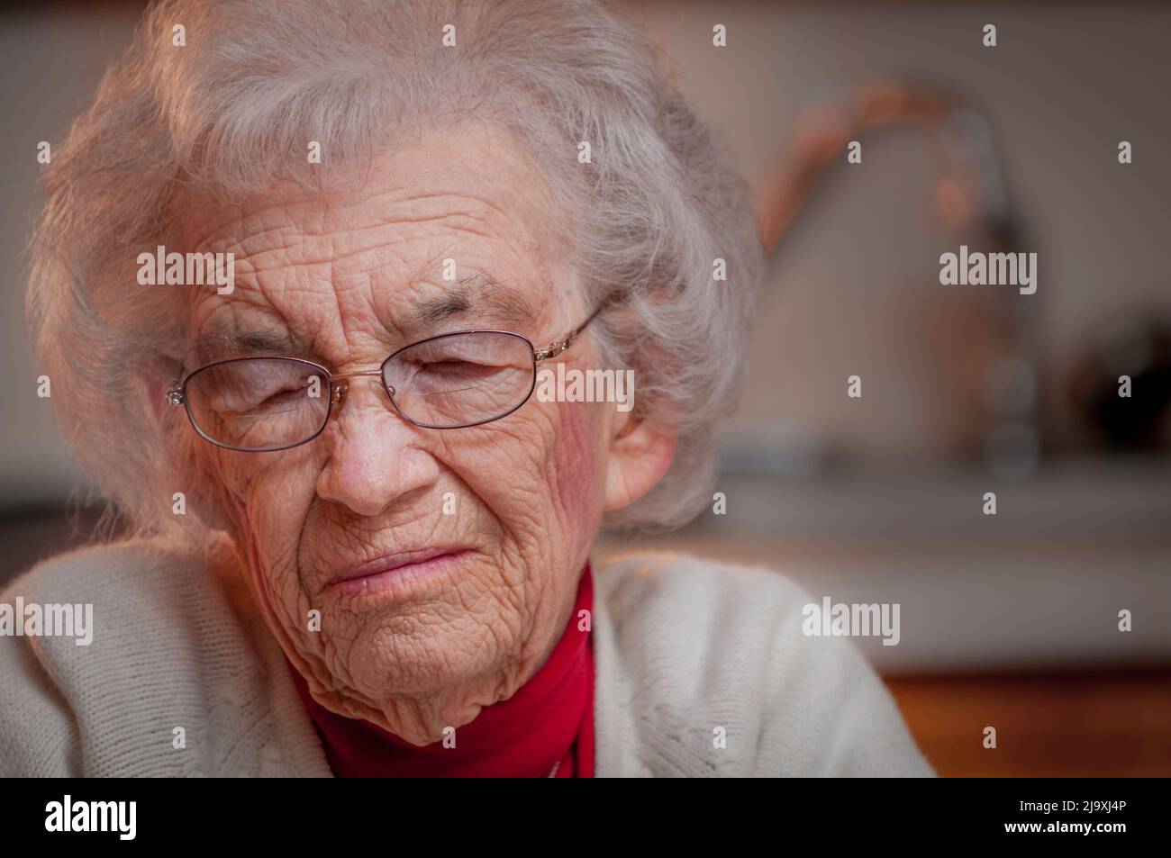 Elderly woman looking sad and depressed Stock Photo - Alamy