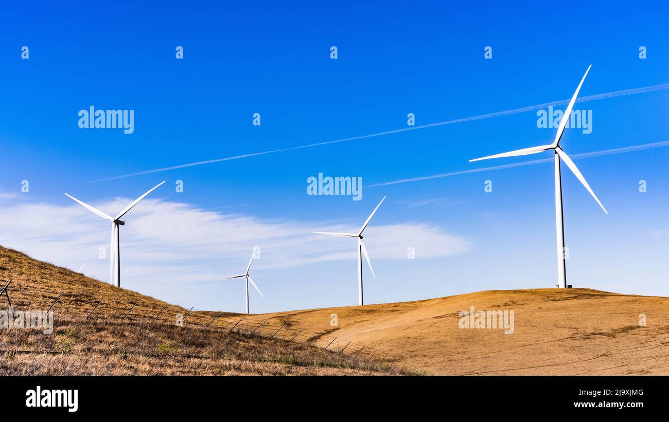 Wind turbines on the top of golden hills in Contra Costa County, East San Francisco bay area, California Stock Photo