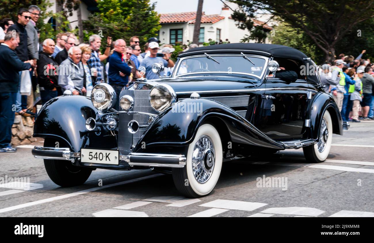 A 1937 Mercedes-Benz 540K Cabriolet in the Pebble Beach Concours d'Elegance event on Ocean Avenue in Carmel-by-the-Sea during Monterey car week Stock Photo