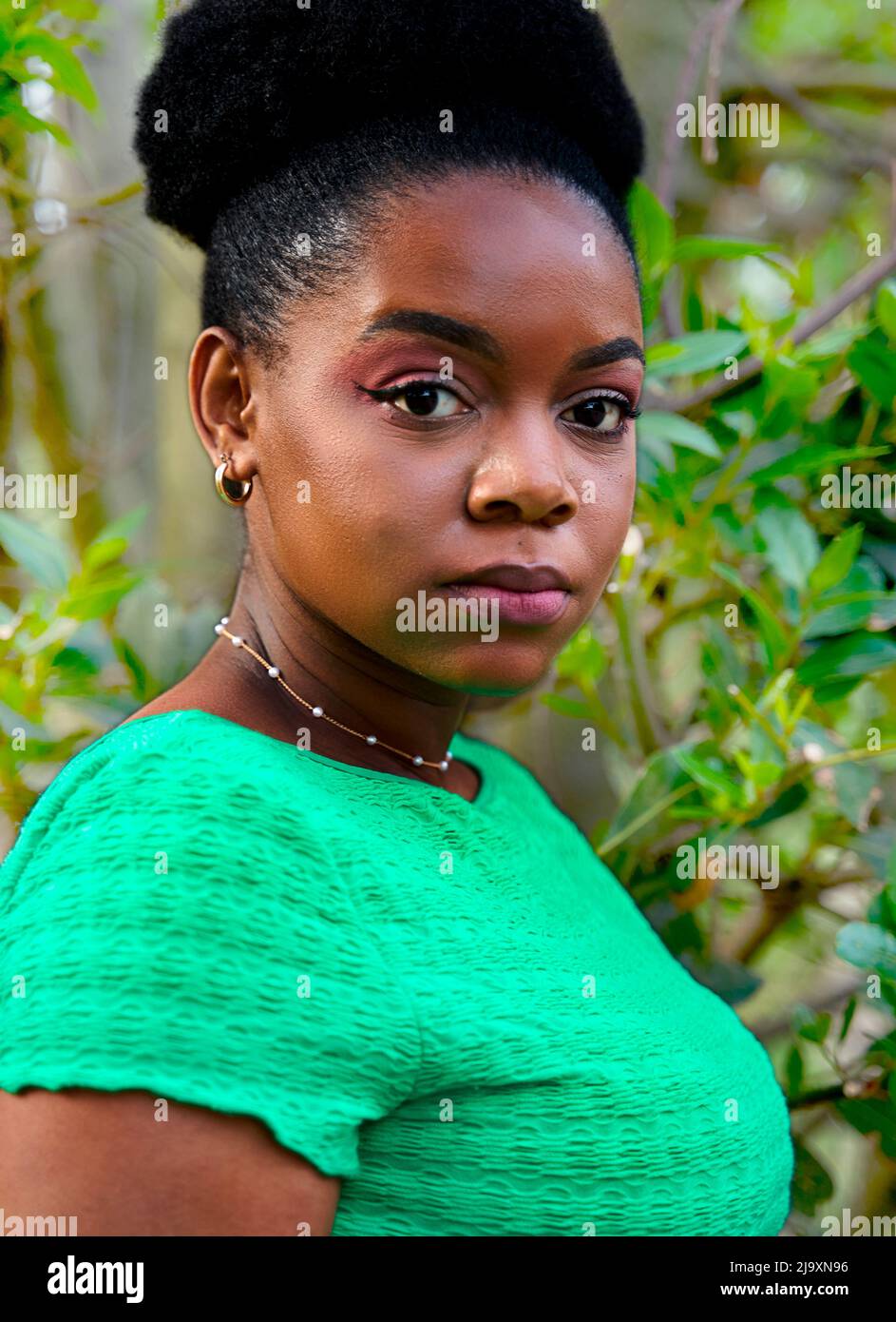 Close up portrait of a beautiful young woman with afro hairstyle Stock ...