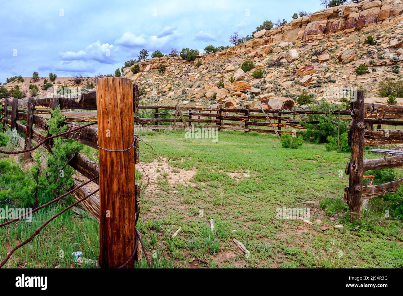 Horse corral with big wood post for the gate in the high desert of New Mexico. Stock Photo