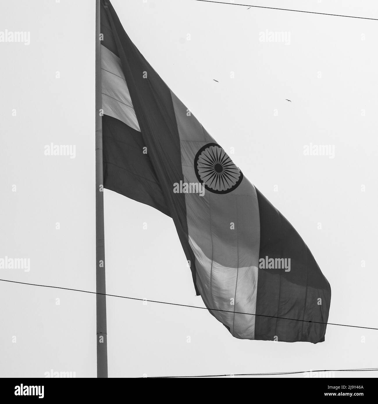 India flag flying at Connaught Place with pride in blue sky, India flag