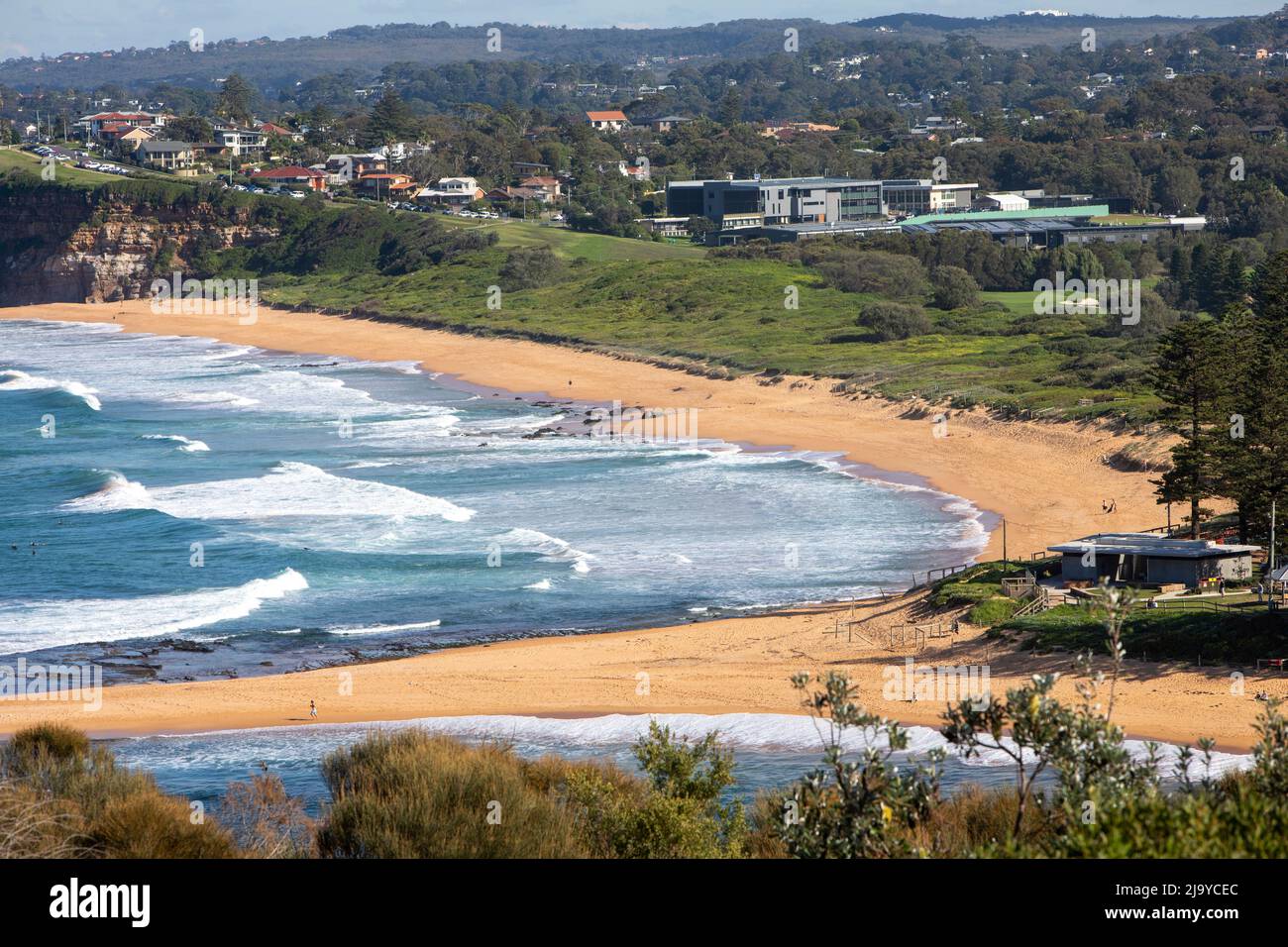 Mona Vale beach and coastline with Mona Vale hospital in shot,Sydney