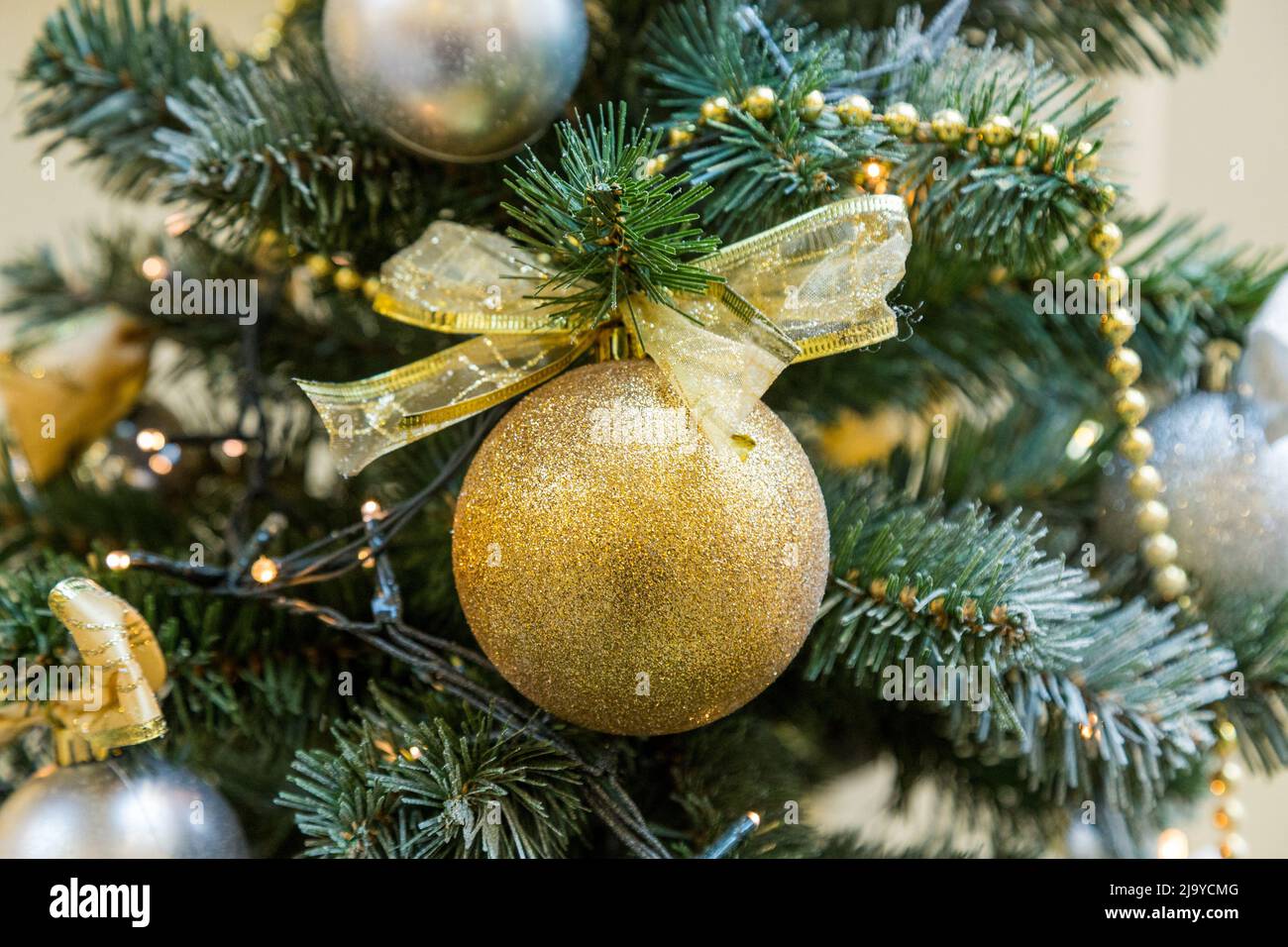 Christmas decorations on the branches of fir tree Stock Photo Alamy