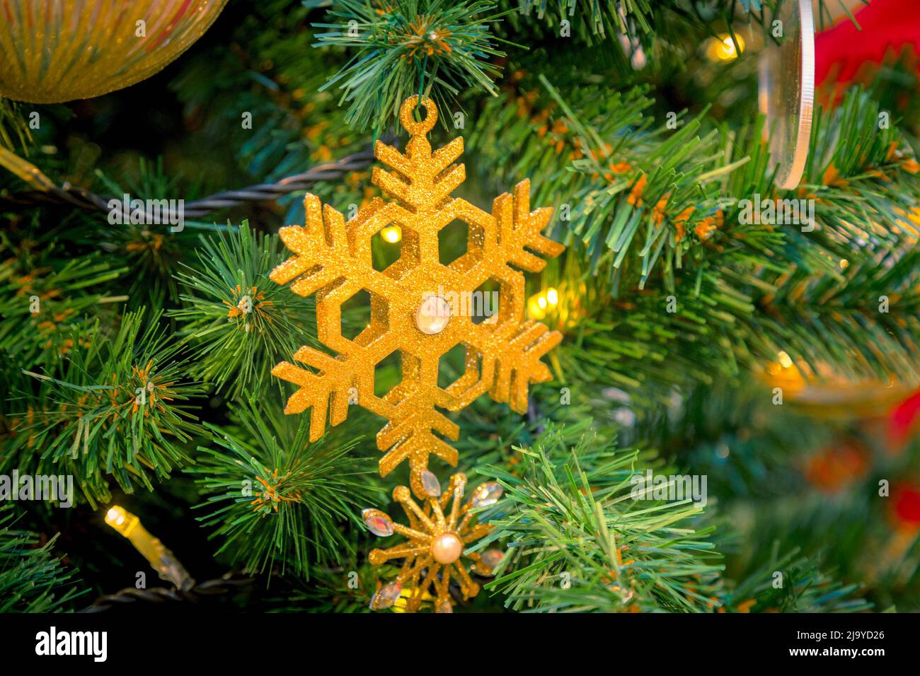 Christmas decorations on the branches of fir tree Stock Photo Alamy