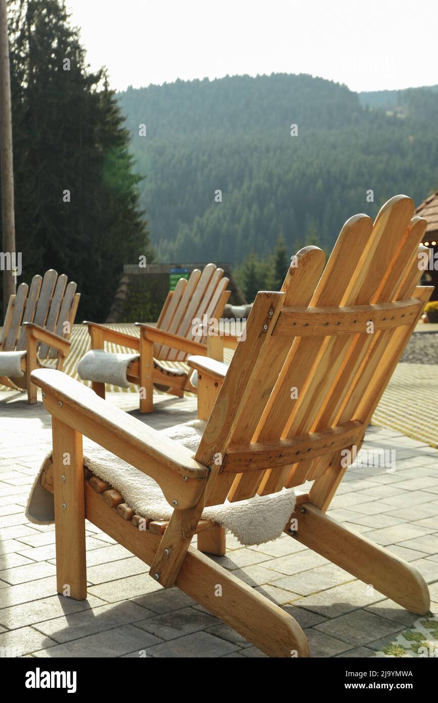 Wooden chairs for relaxing outdoor in mountain resort Stock Photo