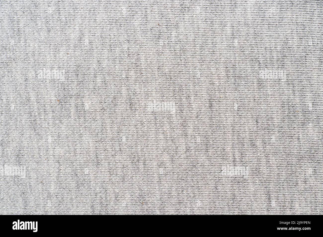 Large gray fabric texture or background, knitted cotton cloth, top view Stock Photo