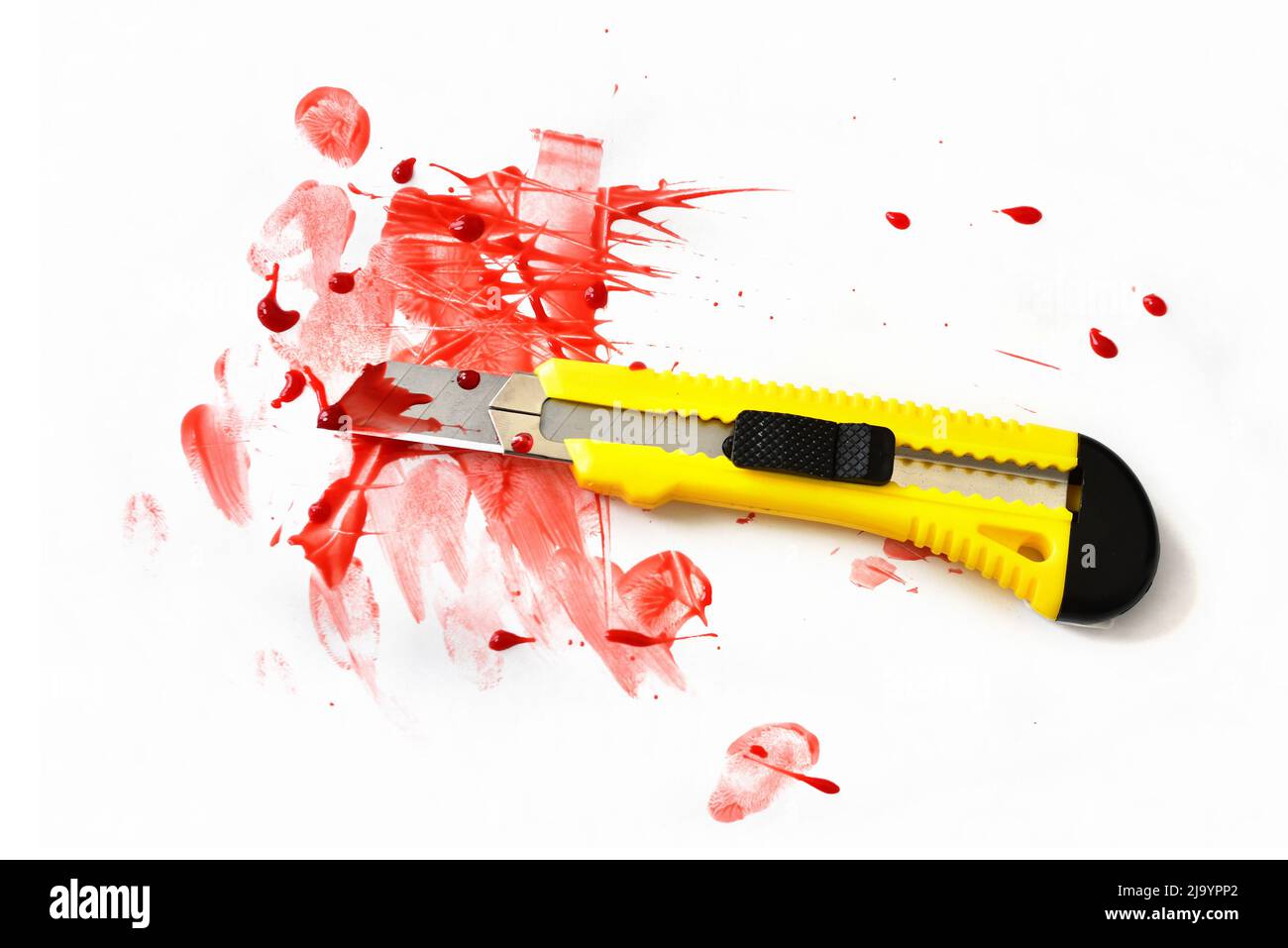 yellow stanley knife with blood Stock Photo