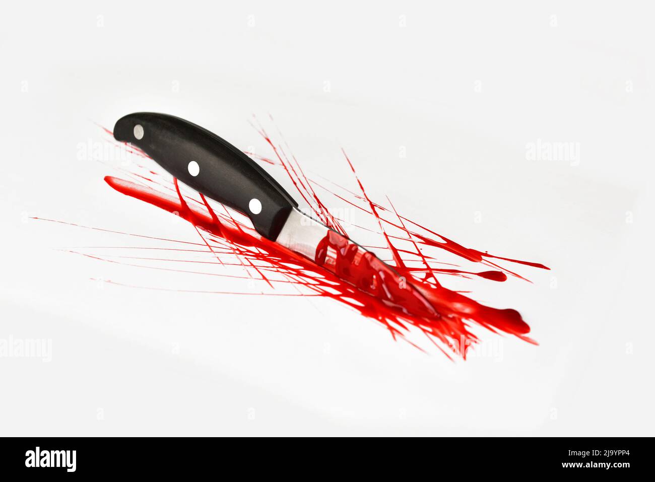 bloody knife on white background. Stock Photo