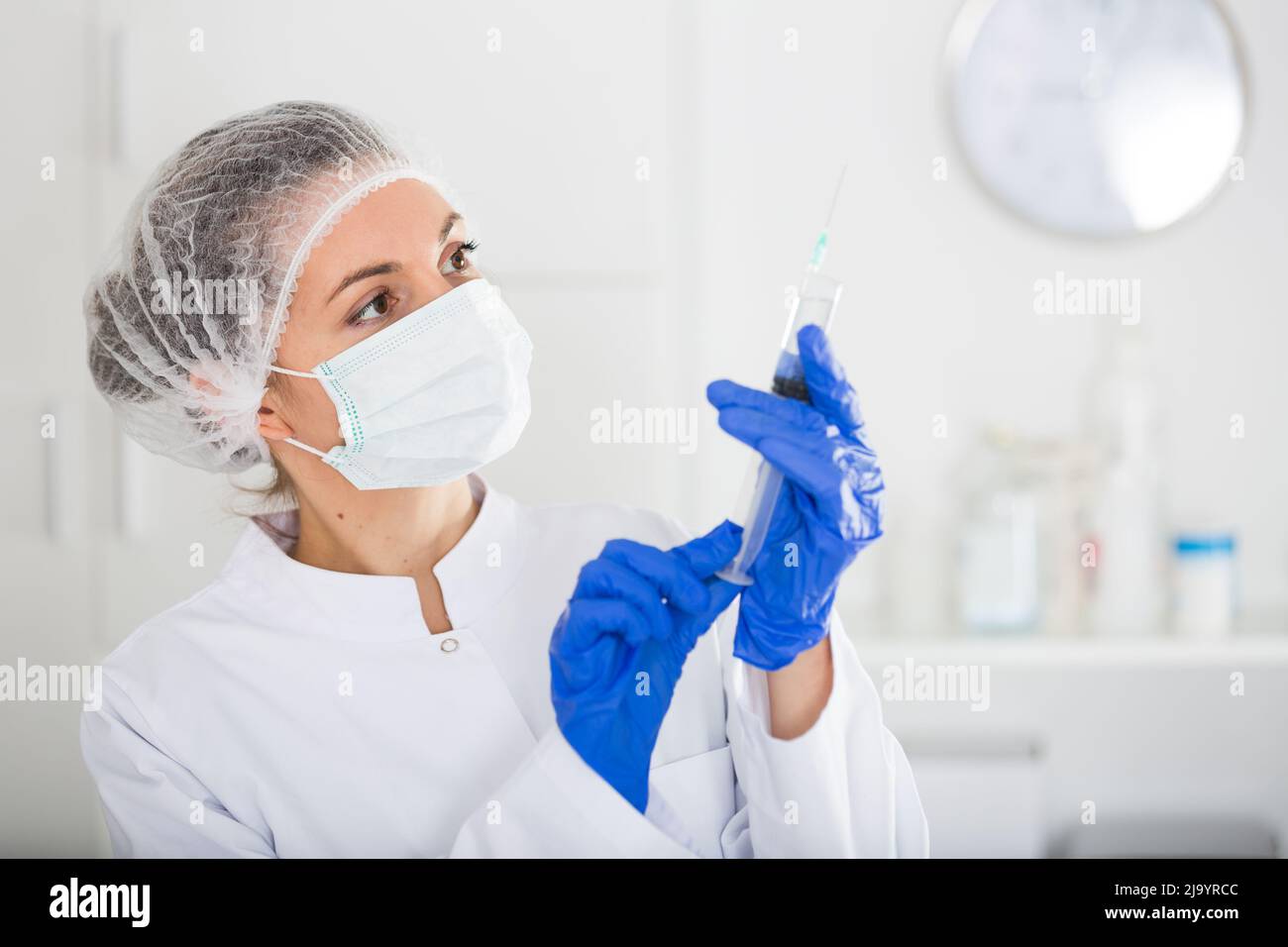 Nurse making injection Stock Photo - Alamy
