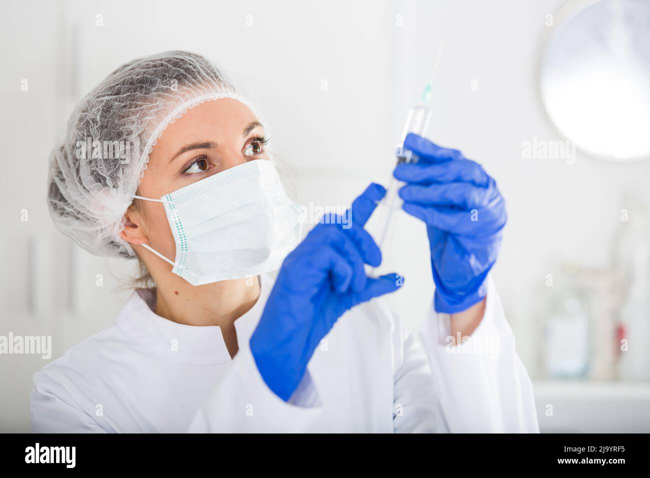 Nurse making injection Stock Photo - Alamy