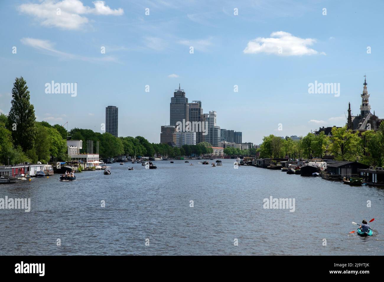 View From The Nieuwe Amstelbrug Bridge At The Amstelriver Amsterdam The Netherlands 24-5-2022 Stock Photo
