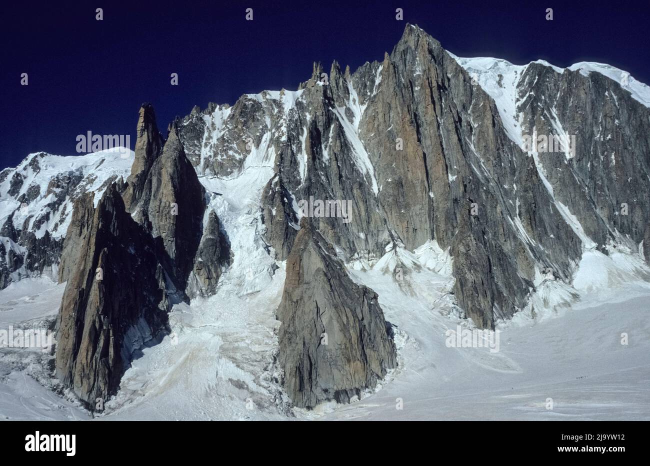 View from a gondola of the Panoramic Mont-Blanc on Mont Blanc du Tacul with Capucin, Aiguille du Diable and Vallée Blanche. Chamonix,  France, 1990 Stock Photo
