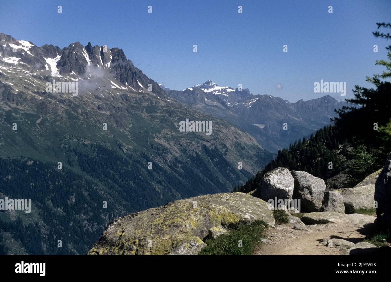 The Aiguilles Rouges seen from the Plan d'Aiguille to Montenvers hiking trail, Chamonix-Mont-Blanc, France,1990 Stock Photo