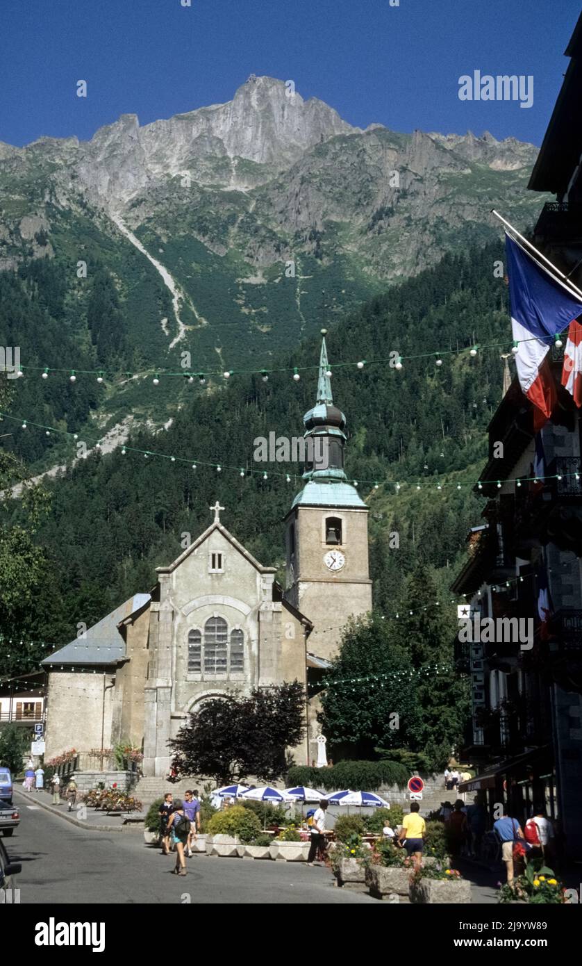 Église Saint-Michel de Chamonix-Mont-Blanc, parish church of Chamonix, with Le Brévènt in the background. Chamonix,Haute Savoie, France, July 1990 Stock Photo