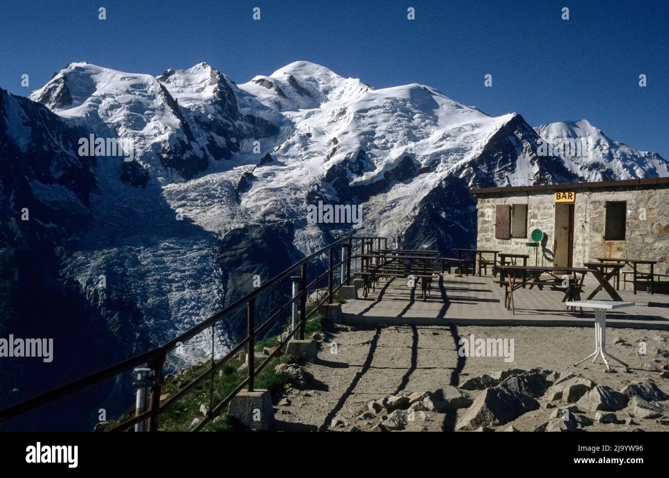On the viewing platform of the mountain station of the Le Brévènt cable car. View of Mont Blanc in the early morning. Chamonix-Mont-Blanc, France,1990 Stock Photo