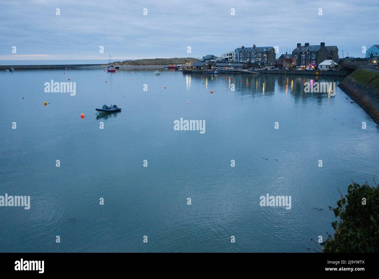 Low light image of looking towards Barmouth harbour at dusk Stock Photo