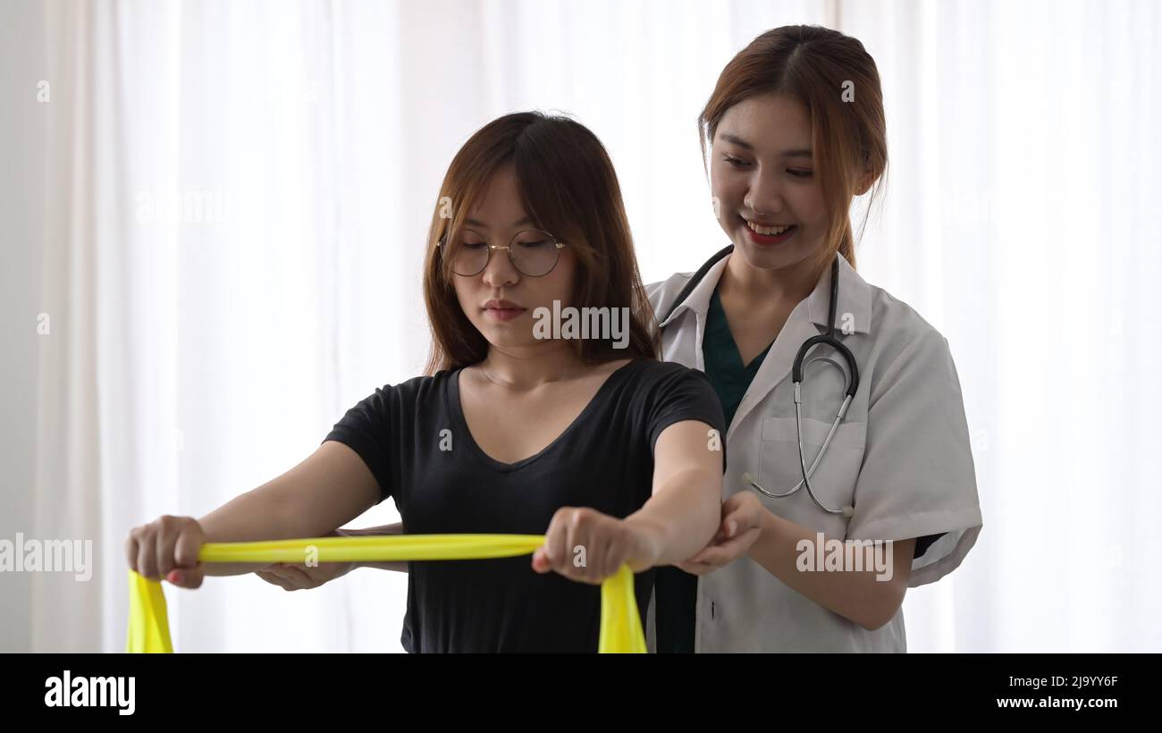 Patient doing some special exercises under supervision of ...