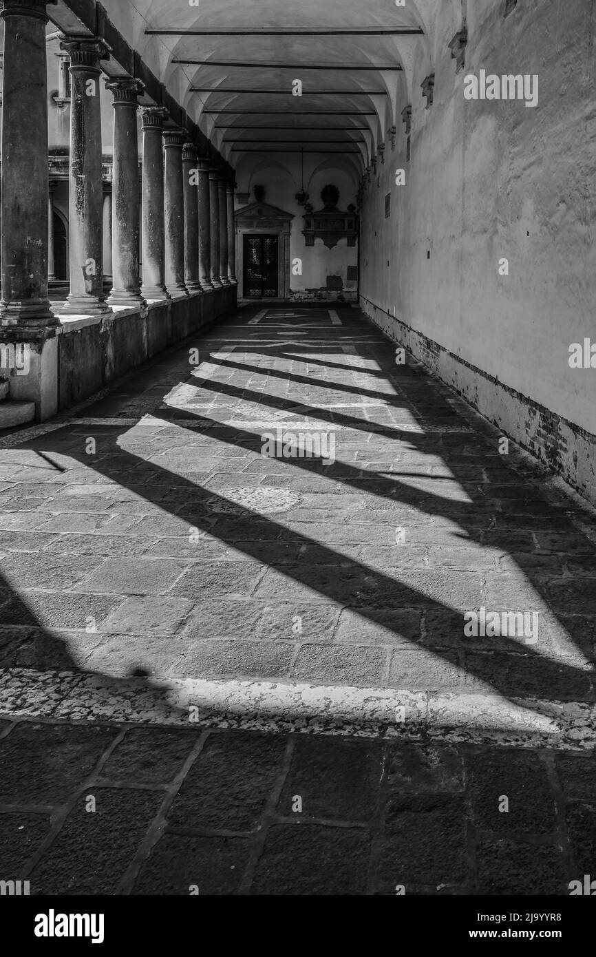 Shadows in a Venetian Cloisters, Venice, Italy Stock Photo