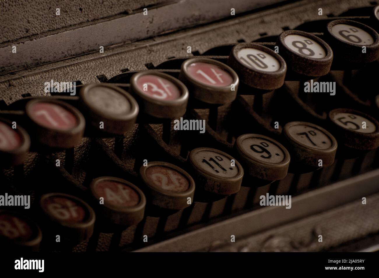 Keys on an old stile cash register Stock Photo