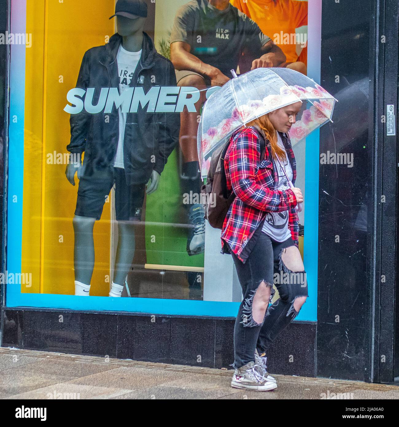 Preston, Lancashire.  UK Weather 26 May 2022.  No signs of summer season as yet another rainy start to the day for shops, shoppers and shopping in Preston. A dull and wet start to today, with spells of rain moving in.  Credit. MediaWorldImages/AlamyLiveNews Stock Photo
