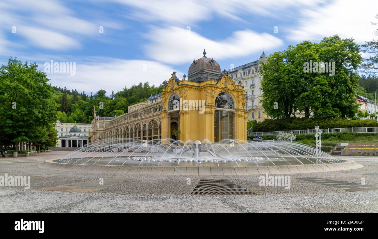 Main colonnade and Singing fountain in Marianske Lazne (Marienbad) - great famous Bohemian spa town in the western part of the Czech Republic - Stock Image