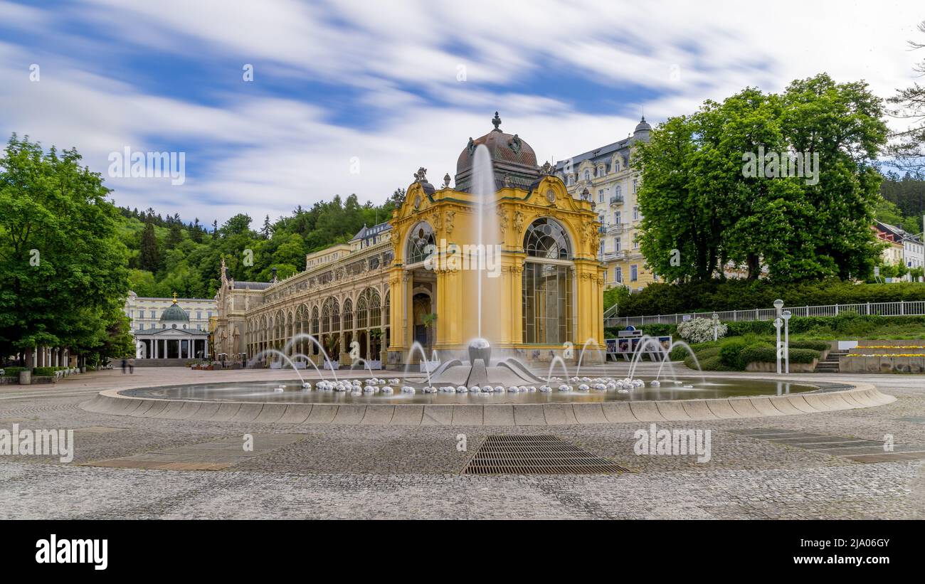 Main colonnade and Singing fountain in Marianske Lazne (Marienbad) - great famous Bohemian spa town in the western part of the Czech Republic - Stock Image