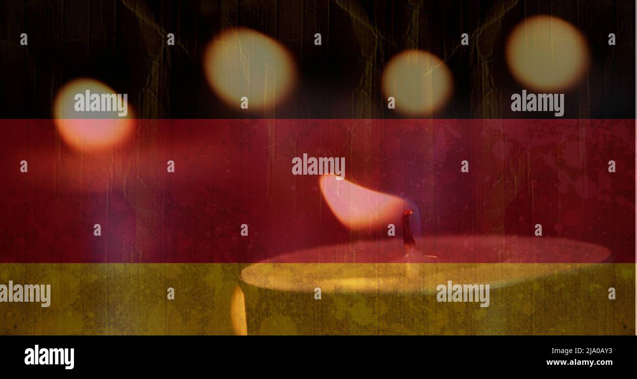 German flag with candle going out Stock Photo Alamy