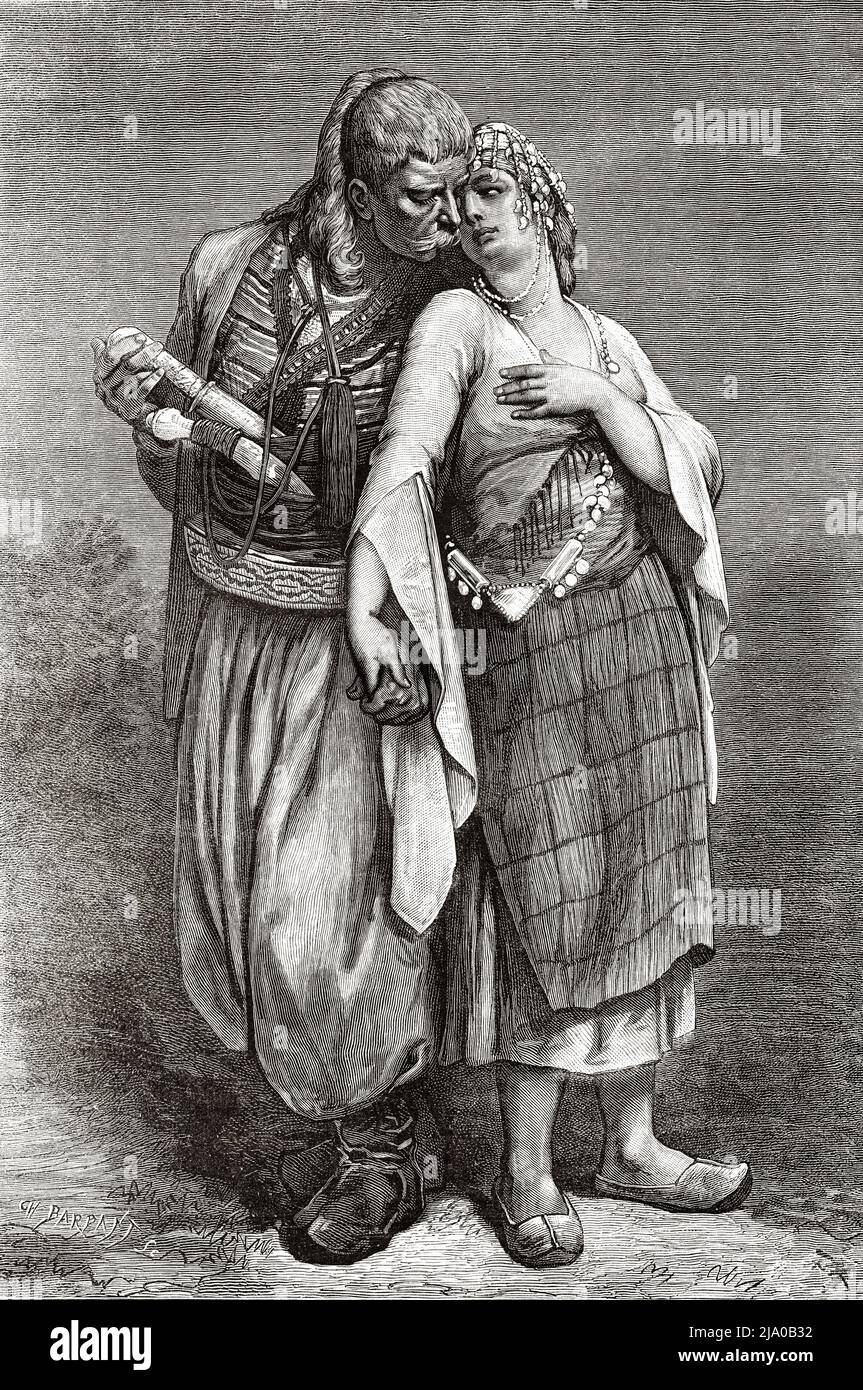 Man and beautiful young woman in their marriage engagement, Nusayriyah Mountains. Syria, Middle East. The Nusayris by Léon Cahun 1878. Le Tour du Monde 1879 Stock Photo