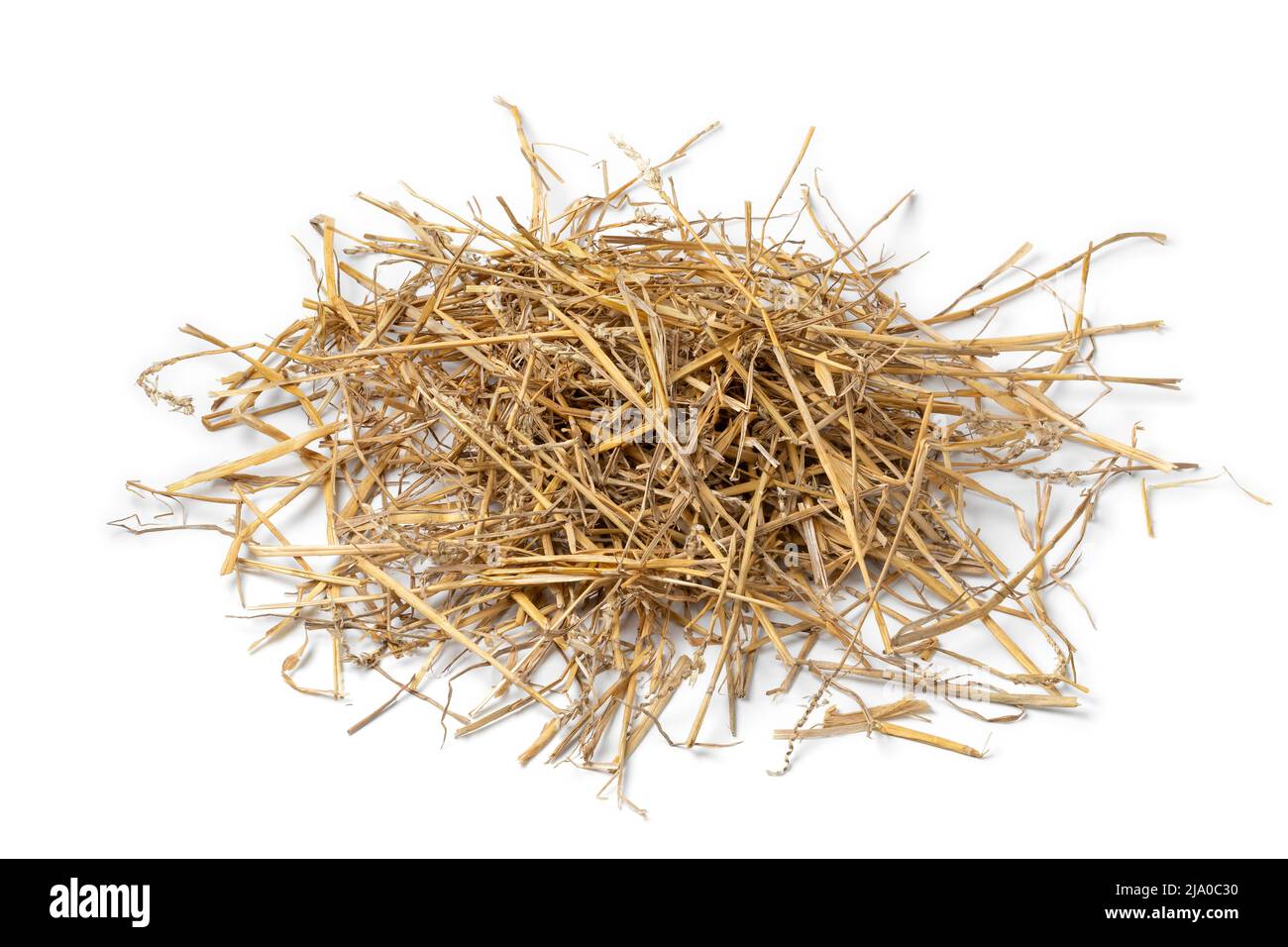 Heap of dried straw isolated on white background Stock Photo