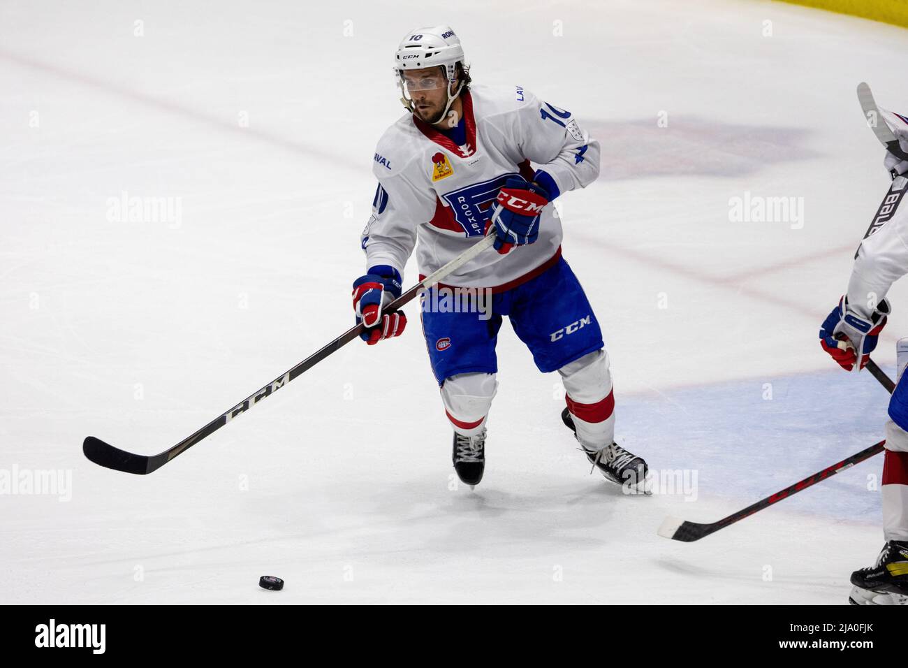 May 25, 2022: Laval Rocket forward Jean-Sebastien Dea (10) makes a pass in  the first period against the Rochester Americans. The Rochester Americans  hosted the Laval Rocket in an American Hockey League