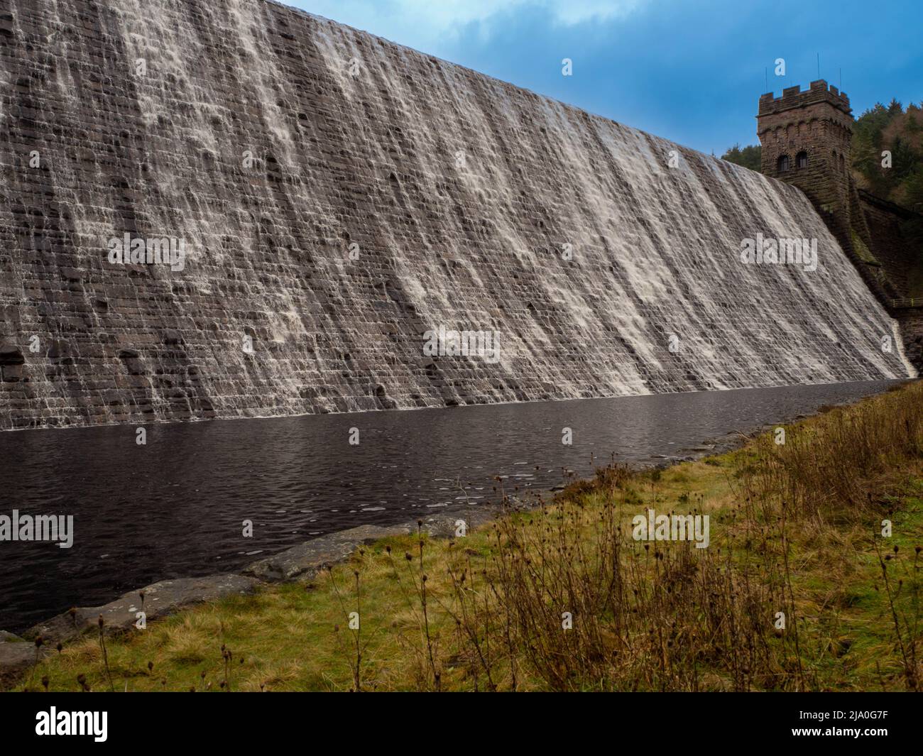 Derwent dam overflowing the retaining wall. Stock Photo