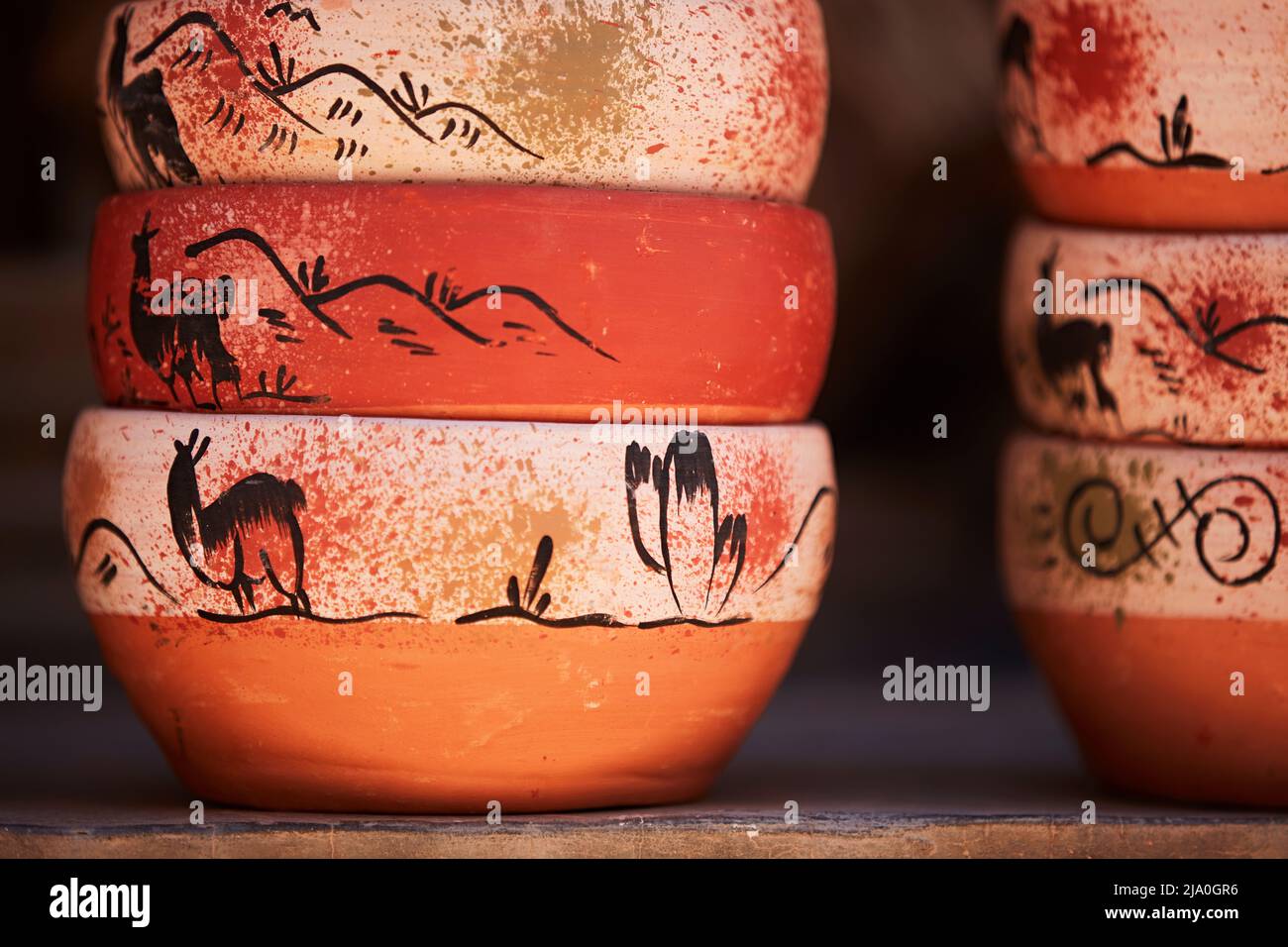 Detail of handmade terracotta pots on sale in a street stand in the Humahuaca historical cask, Jujuy province, Argentina. Stock Photo