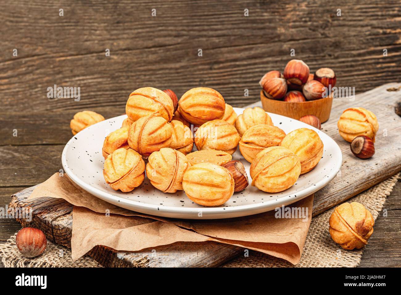 Cookies in the shape of walnuts with condensed milk cream filling