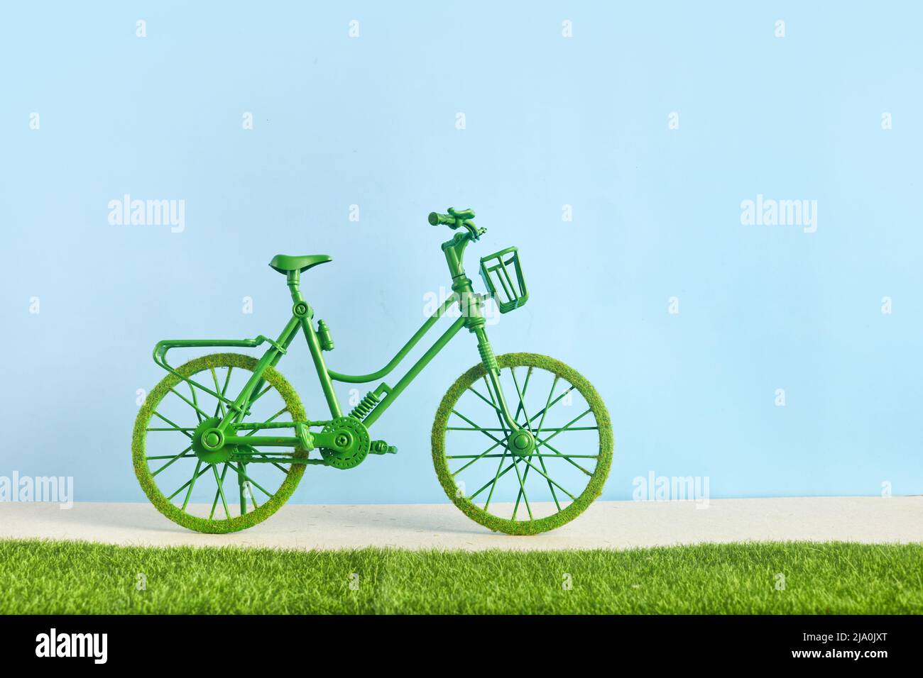 World Bicycle Day. Green bicycle and world. Environment preserve. Stock Photo