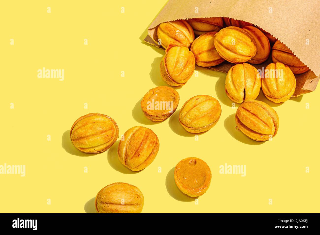 Cookies in the shape of walnuts with condensed milk cream filling