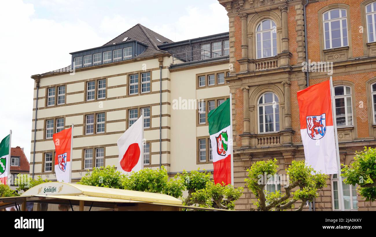 Japantag 2022: Flags of Japan, the City of Düsseldorf and the state of Northrhine-Westphalia. Stock Photo