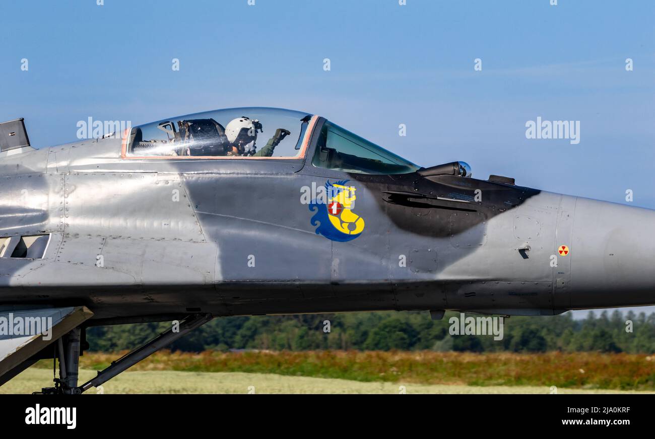 Pilot in the cockpit of a MiG-29 Fulcrum fighter jet plane taxiing towards the runway at Florennes Airbase. Belgium - June 15, 2017 Stock Photo