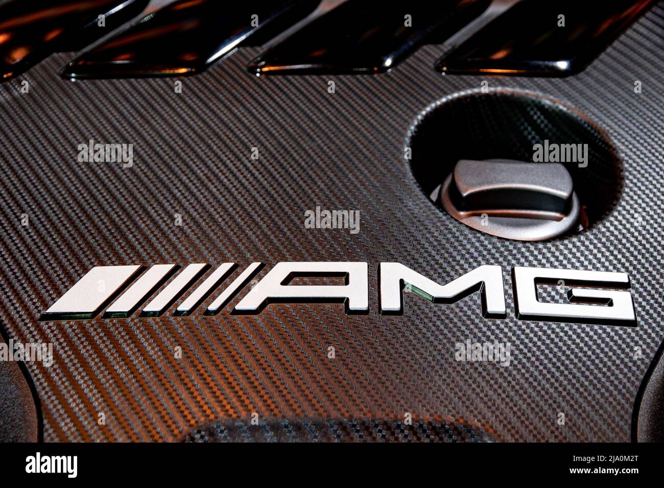 Mercedes-AMG engine logo on the engine cover of a sports car at the Frankfurt IAA Motor Show. Germany - September 11, 2019 Stock Photo