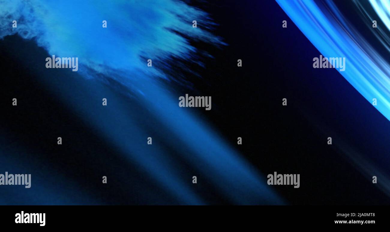 Image of blue smoke and lines on black background Stock Photo