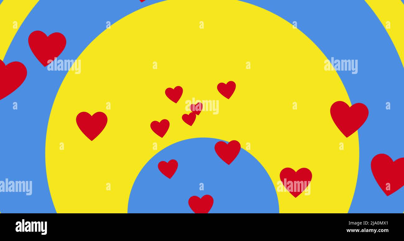 Image of hearts floating over circles in colours of ukrainian flag Stock Photo